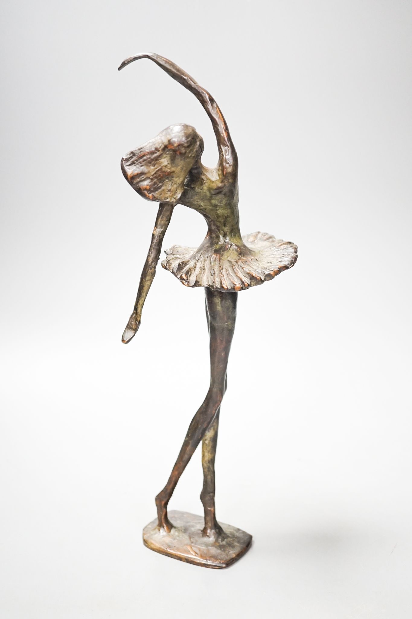 A 20th century bronze figure of a ballerina, indistinctly initialled CAN (?), 33cm